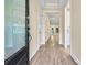 Bright foyer with hardwood floors leads into an open floor plan at 8121 Festival Way, Charlotte, NC 28215