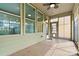 The light-filled sunroom provides views of the backyard through large windows at 8121 Festival Way, Charlotte, NC 28215
