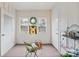 Cozy sunroom featuring a large windows and carpet floors at 920 Mcalway Rd, Charlotte, NC 28211