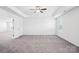 Well-lit primary bedroom with neutral carpet and recessed ceiling lighting at 5108 Silver Creek Ln, Denver, NC 28037