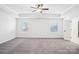 Spacious main bedroom with tray ceilings, recessed lighting and large windows at 5108 Silver Creek Ln, Denver, NC 28037