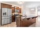 Modern kitchen features stainless steel appliances and an island at 1002 Tj Dr, Monroe, NC 28112