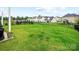 Large, green, fenced backyard providing ample space for outdoor activities and privacy at 4280 Stream Dale Cir, Concord, NC 28027