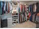 Organized walk-in closet with shelving, hanging rods, and ample storage space at 4280 Stream Dale Cir, Concord, NC 28027