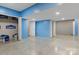 Unfinished basement with concrete floors and blue walls at 5441 Suttlemyre Ln, Hickory, NC 28601