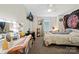 Bedroom with vanity, a bed, and decorative wall hanging at 905-A Linney Ln, Shelby, NC 28152