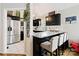 Modern kitchen with dark cabinetry, granite counters, and breakfast bar at 905-A Linney Ln, Shelby, NC 28152