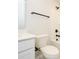 Bathroom featuring a white vanity, black hardware, and a shower and tub at 10507 Boudreaux St, Huntersville, NC 28078