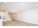 Open concept dining room with light floors and chandelier at 10507 Boudreaux St, Huntersville, NC 28078