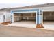 Two car garage with door open and light blue trim on a sunny day at 10507 Boudreaux St, Huntersville, NC 28078