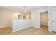 Upstairs hallway with access to bedrooms and closets at 10507 Boudreaux St, Huntersville, NC 28078