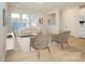 Cozy living room with large windows providing plenty of natural light and stylish decor at 10507 Boudreaux St, Huntersville, NC 28078