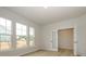 Spacious office with hardwood floors, large windows, and French doors at 10507 Boudreaux St, Huntersville, NC 28078
