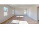 Spacious living room with hardwood floors and lots of natural light at 1800 Augustine St, Monroe, NC 28112