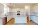 Modern kitchen with white cabinets, granite countertops, and stainless steel appliances at 1805 Augustine St, Monroe, NC 28112