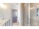 Bathroom features a walk-in shower and double vanity at 1809 Augustine St, Monroe, NC 28112