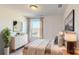 Spacious bedroom with a dresser and large window with a view at 1809 Augustine St, Monroe, NC 28112