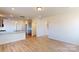 Open dining area with hardwood floors and kitchen access at 1809 Augustine St, Monroe, NC 28112