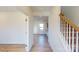 Bright entryway with hardwood floors and staircase at 1809 Augustine St, Monroe, NC 28112