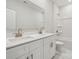 Bathroom with double vanity and white cabinets at 126 Brooke Forest Ct, Mooresville, NC 28115