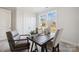 Spacious home office with a rustic desk and window views at 126 Brooke Forest Ct, Mooresville, NC 28115