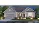 Charming craftsman-style home with stone accents, covered porch, and a two-car garage at 132 Brooke Forest Ct, Mooresville, NC 28115