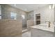 Primary bathroom with a large walk-in shower and double vanity at 223 E Warfield Dr, Mooresville, NC 28115