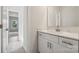 Small bathroom with a white vanity and a view of another bedroom at 223 E Warfield Dr, Mooresville, NC 28115