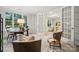 Home office with built-in shelving and French doors leading to another room at 223 E Warfield Dr, Mooresville, NC 28115