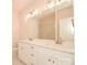 Bathroom with double vanity, quartz countertop, and a walk-in shower at 7805 Medlin Rd, Monroe, NC 28112