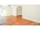 Bright bedroom with hardwood floors and access to attic at 7805 Medlin Rd, Monroe, NC 28112