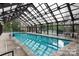 Indoor community pool with glass enclosure at 82220 Standing Oak Dr, Charlotte, NC 28278