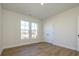 Bright bedroom with hardwood floors and a double door closet at 10505 Boudreaux St, Huntersville, NC 28078