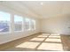 Bright bedroom with large windows and hardwood floors at 10505 Boudreaux St, Huntersville, NC 28078