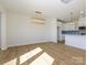 Bright dining room with hardwood floors and a modern chandelier at 10505 Boudreaux St, Huntersville, NC 28078