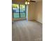 Bright bedroom with large window and carpet flooring at 11052 Cedar View Rd, Charlotte, NC 28226