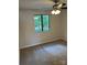 Bright bedroom with carpet flooring, ceiling fan, and a window offering natural light at 11052 Cedar View Rd, Charlotte, NC 28226