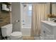 Updated bathroom with tub shower combo and white vanity at 200 Cleveland Ave, Shelby, NC 28150