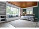 Bedroom with built-in window seat and wood paneled ceiling at 200 Cleveland Ave, Shelby, NC 28150