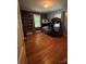 Bedroom with hardwood floors, bunk beds and wood-paneled walls at 200 Cleveland Ave, Shelby, NC 28150