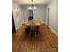 Charming dining room featuring hardwood floors and a farmhouse table at 200 Cleveland Ave, Shelby, NC 28150