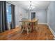 Spacious dining area with hardwood floors and a large wooden table at 200 Cleveland Ave, Shelby, NC 28150