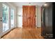 Kitchen boasts barn doors, hardwood floors and French doors at 200 Cleveland Ave, Shelby, NC 28150