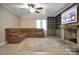 Relaxing living room featuring a fireplace and ample built-in shelving at 200 Cleveland Ave, Shelby, NC 28150