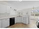 Functional kitchen featuring a breakfast bar overlooking the dining area at 2715 Ballade Dr, Matthews, NC 28105