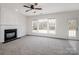 Cozy living room with fireplace and lots of natural light at 2715 Ballade Dr, Matthews, NC 28105