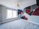 Bedroom with geometric accent wall and ceiling fan at 615 Real Quiet Ct, York, SC 29745