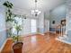 Formal dining room with hardwood floors and patterned wallpaper at 615 Real Quiet Ct, York, SC 29745