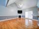 Hardwood floor living room with a fireplace and access to the back yard at 615 Real Quiet Ct, York, SC 29745