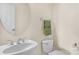 Small bathroom with a single sink and oval mirror at 2024 Holly Villa Cir, Indian Trail, NC 28079